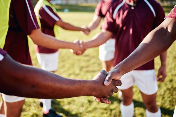 How can sports be used as a tool for conflict resolution and peace-building in international relations?